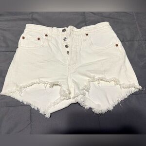 Levi white denim shorts. Fits a size 25.